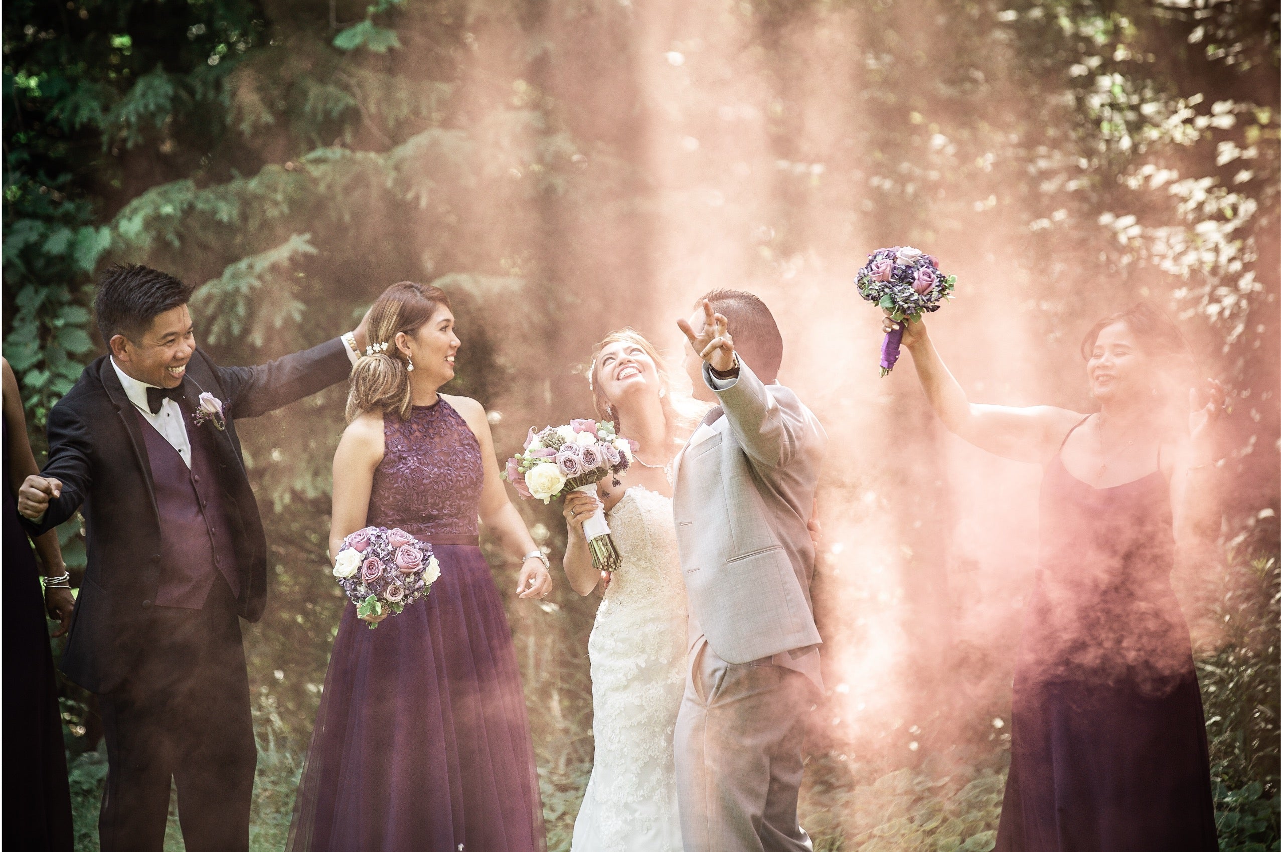 Wedding party celebration with colorful smoke bombs
