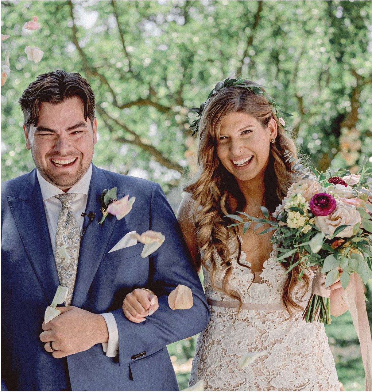 Groom's boutonniere and bride's bouquet held close together